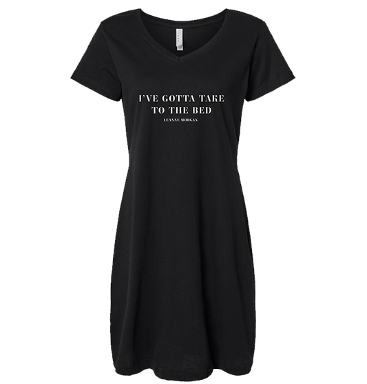 Black short-sleeved nightgown with a v-neck and Leanne's tagline, I've gottan take to the bed on the front